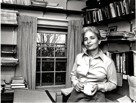 Black and white photo of Professor Zella Luria in her office. 