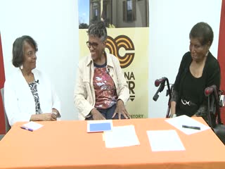 Color photo of Dean Marilyn Glater, Professor Pearl Robinson, and Dean Bobbie Knable. 