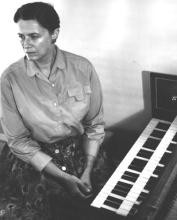 Roslyn Brogue Henning at harpsichord.