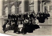 Group of Jackson women seated on the steps on Armistice Day.