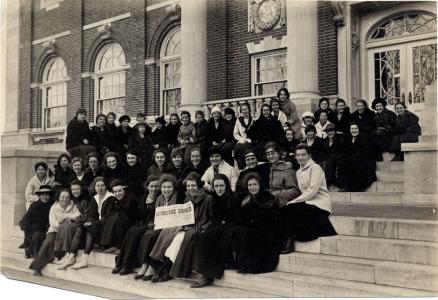 Group of Jackson women seated on the steps on Armistice Day.